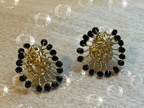 Aretes rayos negros